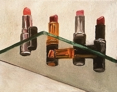 Lipsticks on a Glass Shelf